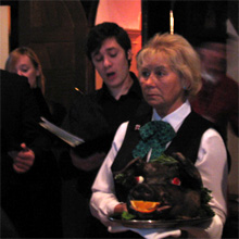 A Boars Head plus accompanying singers